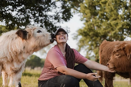 Katie Van Slyke with mini cows