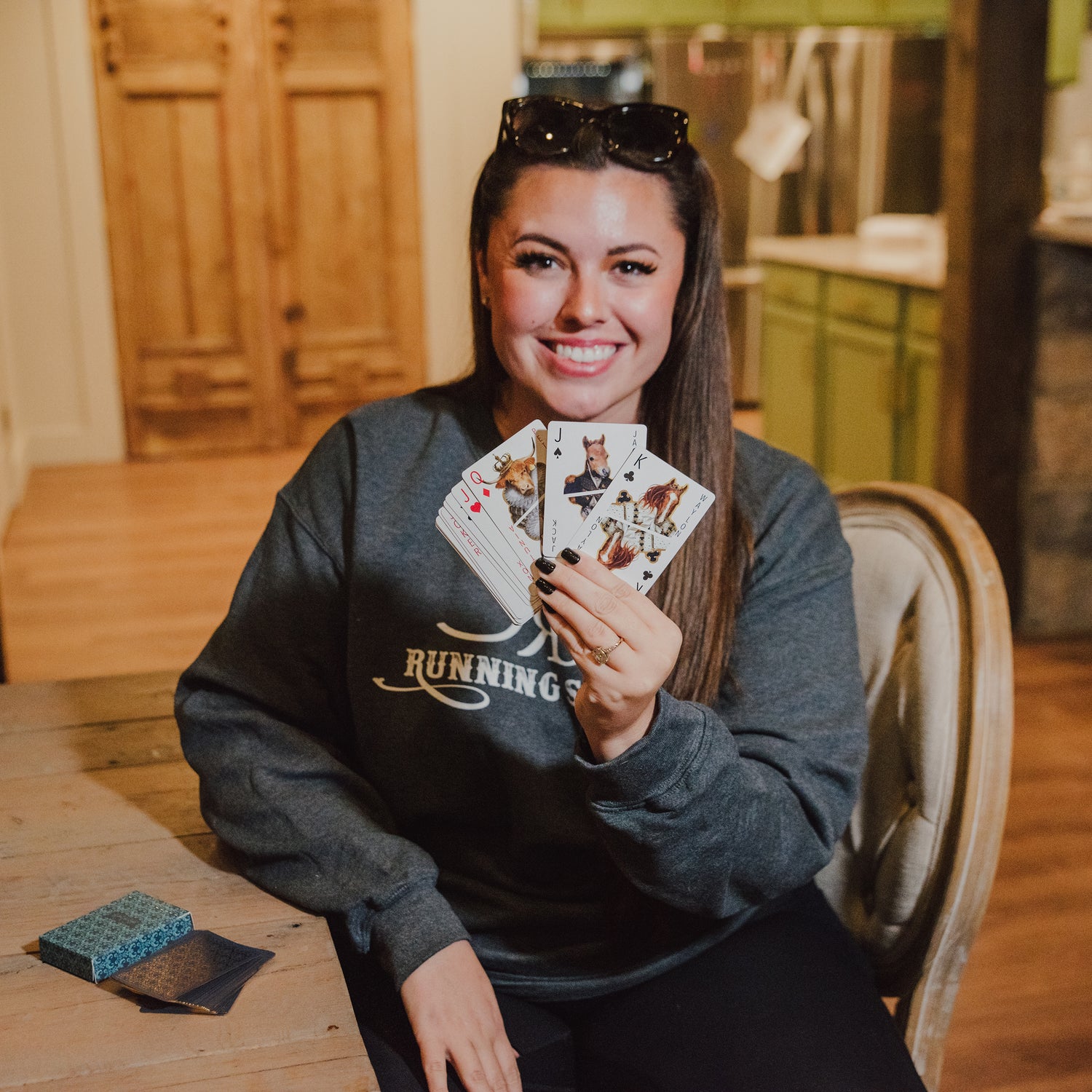 Katie holding cards
