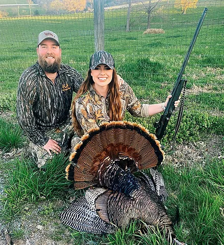 Katie Van Slyke and Johnathan with turkey