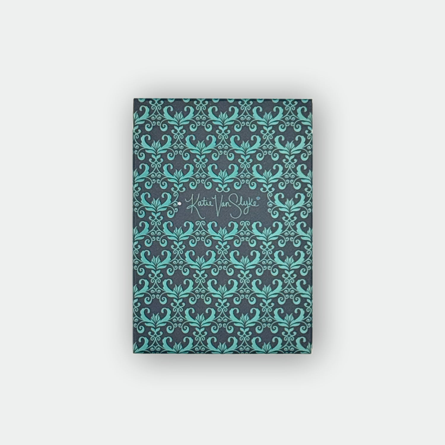 playing card box with teal design